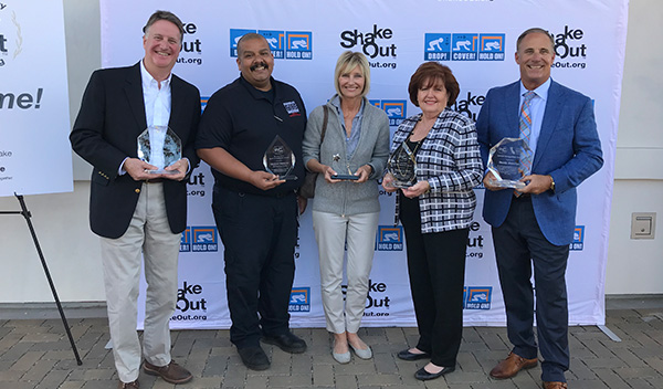 Chris Nance, CEA; Michael Ramirez, San Bernardino County Fire Office of Emergency Services; Bunni Benaron, The Hero In You Foundation; Margaret Vinci, Caltech; Dean Reese, Ready America, receive awards during the 10th Anniversary Ceremony of the Great California ShakeOut in Long Beach, CA on Nov. 1.