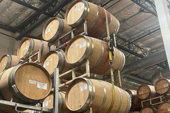 Image: stacked wine barrels